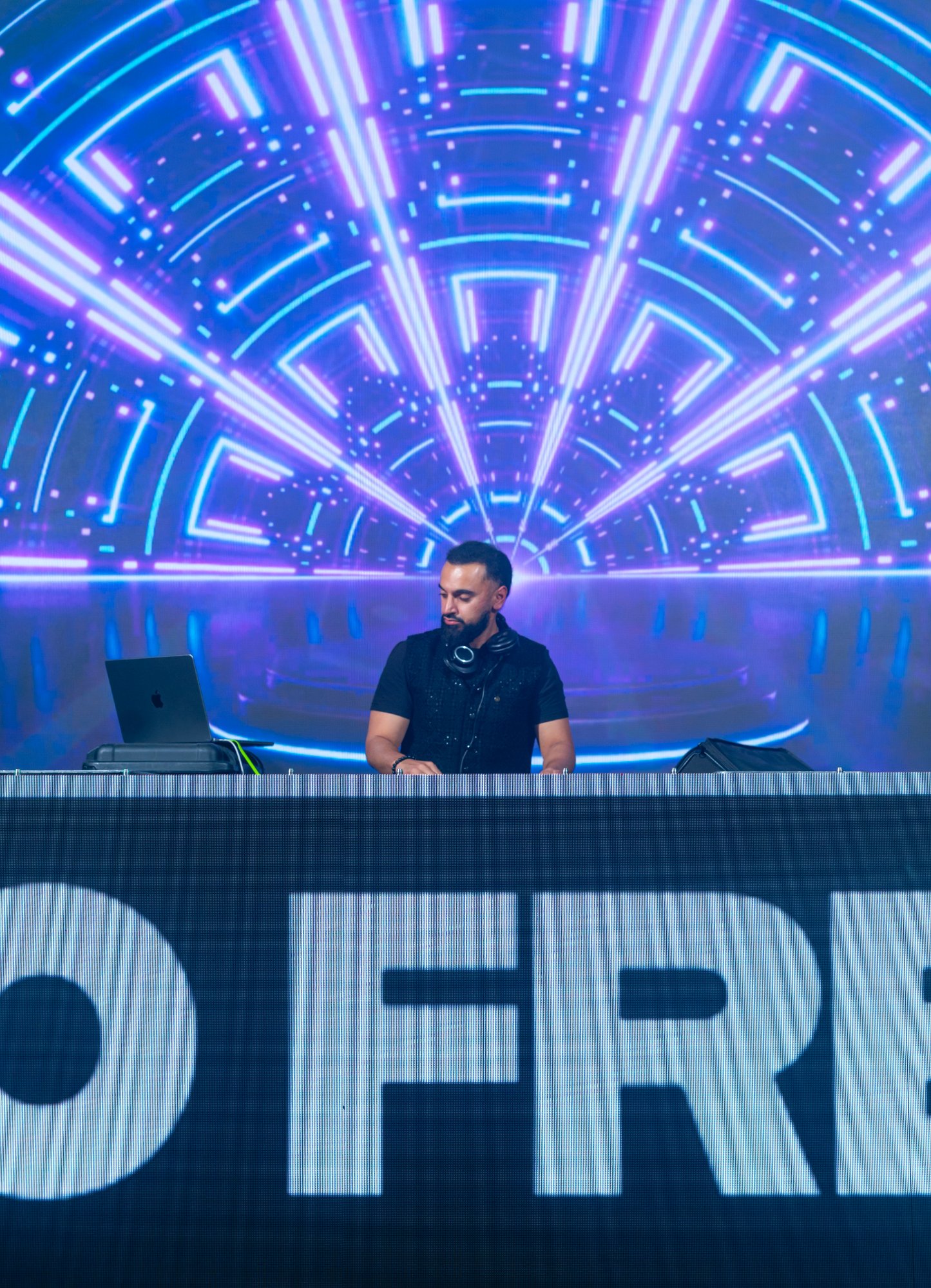 DJ O Fresh on stage with LED visuals